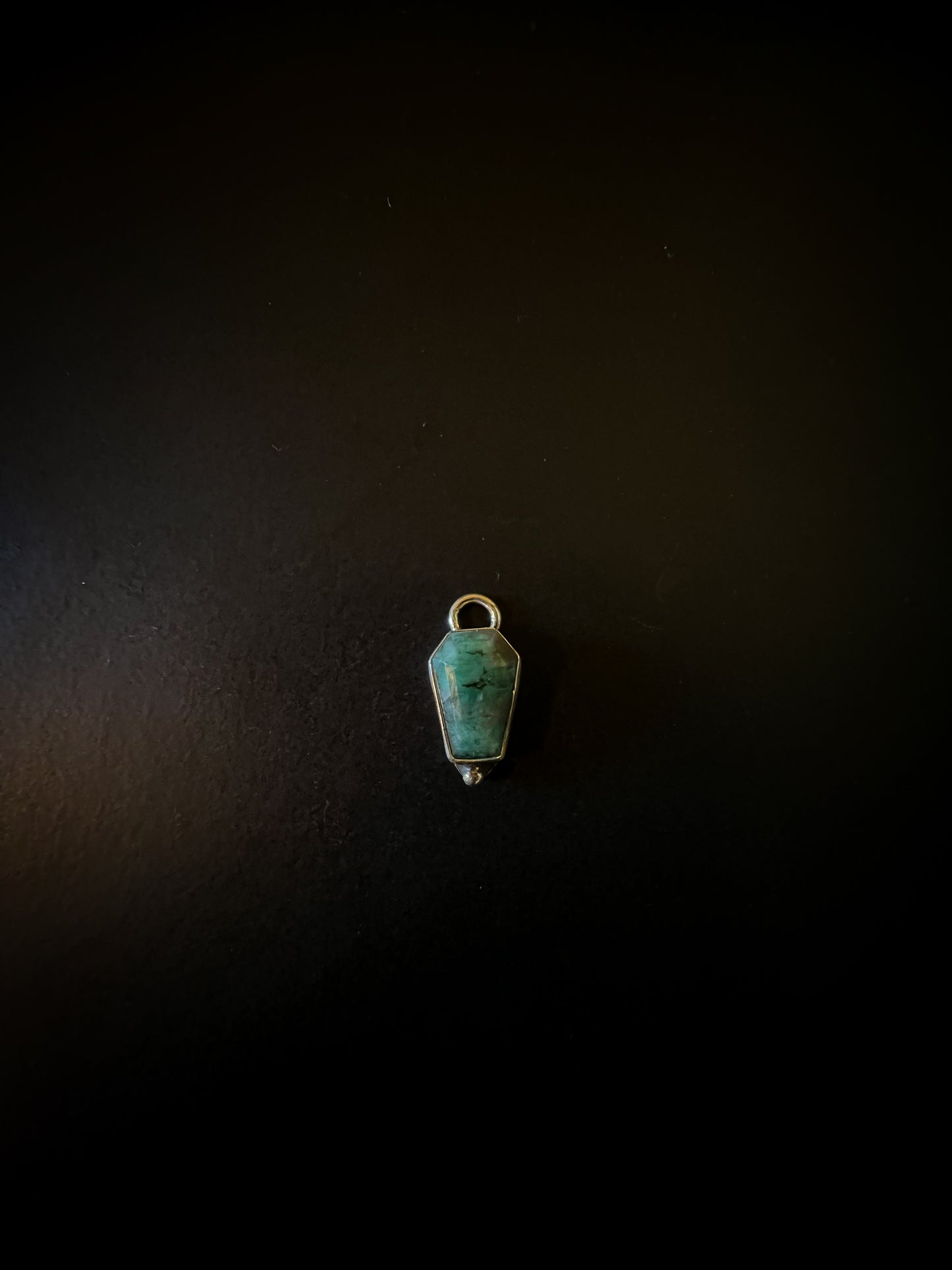 Emerald coffin charms