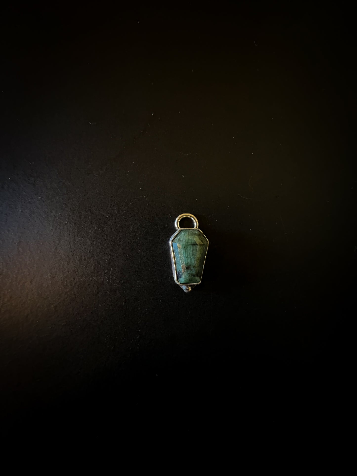 Emerald coffin charms