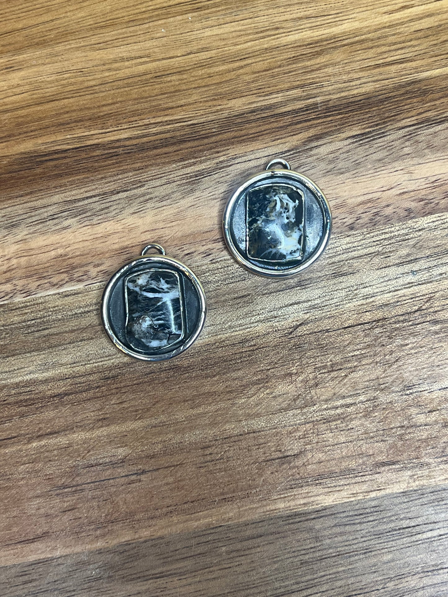 White buffalo charms