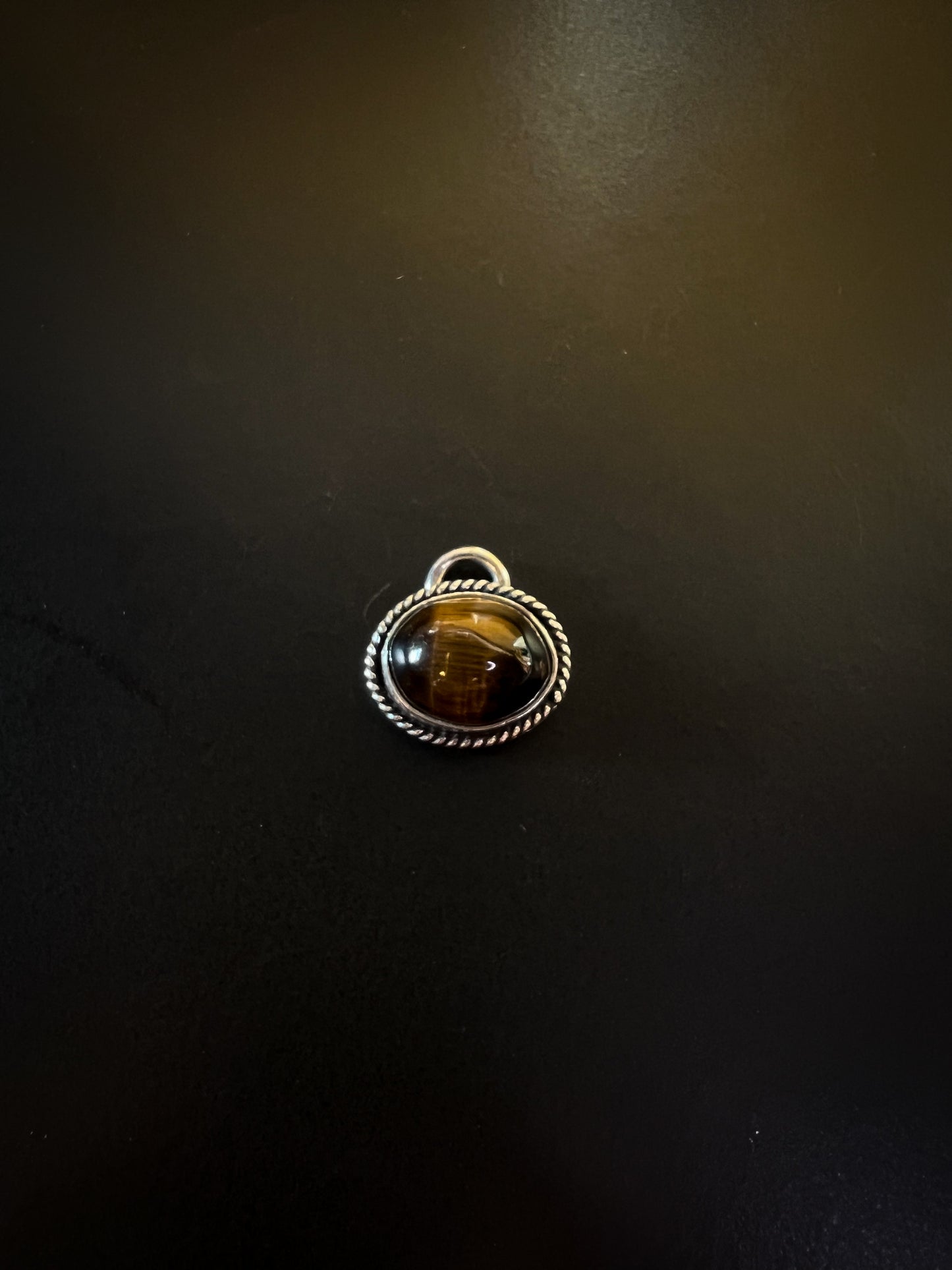 Tiger’s eyes charms