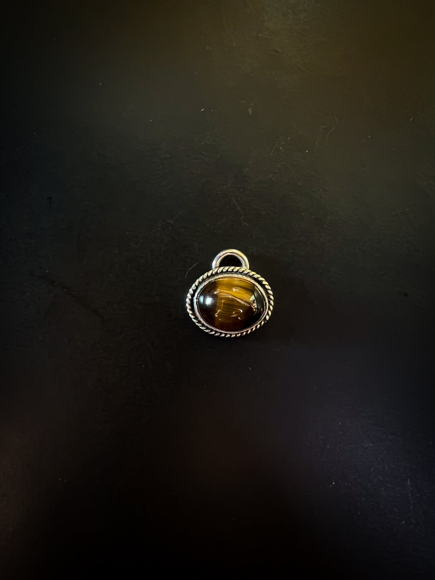Tiger’s eyes charms